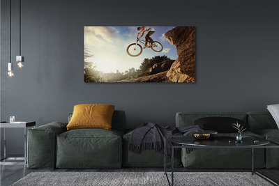Tableaux sur toile canvas Montagne ciel nuages ​​vélo